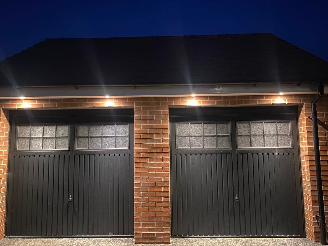 Well lit garage with outdoor security lighting